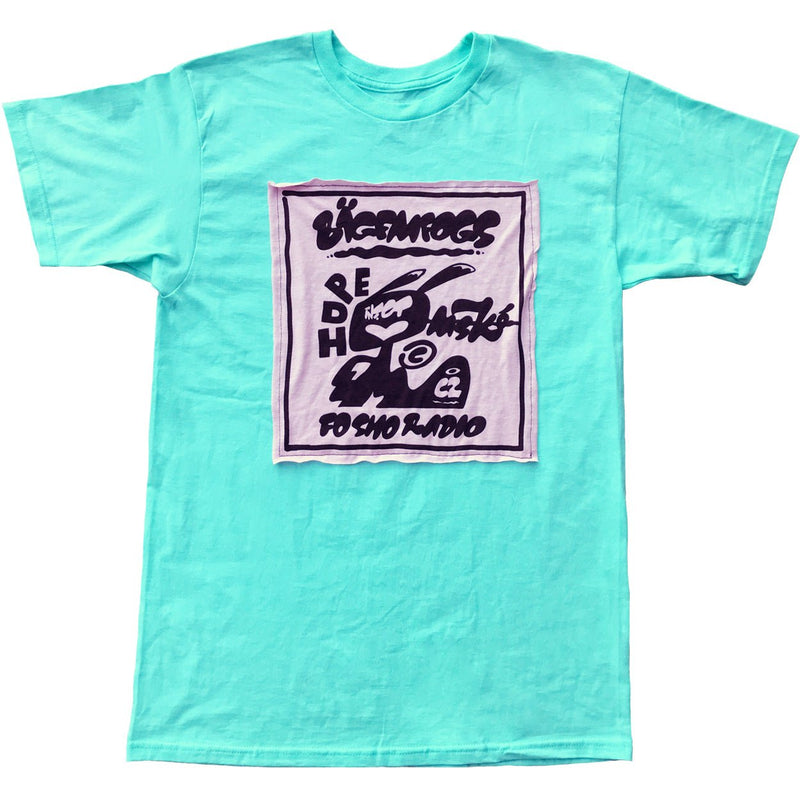 Black print of a cat patch sewn on a teal SS t-shirt.