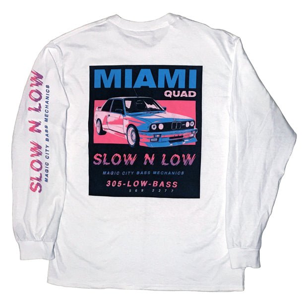 Back print of a car graphic on a white long sleeve tee with left sleeve print.